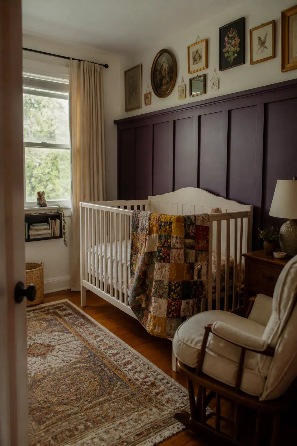 Deep plum board and batten nursery walls with white crib, vintage quilt, and gallery wall above paneling.