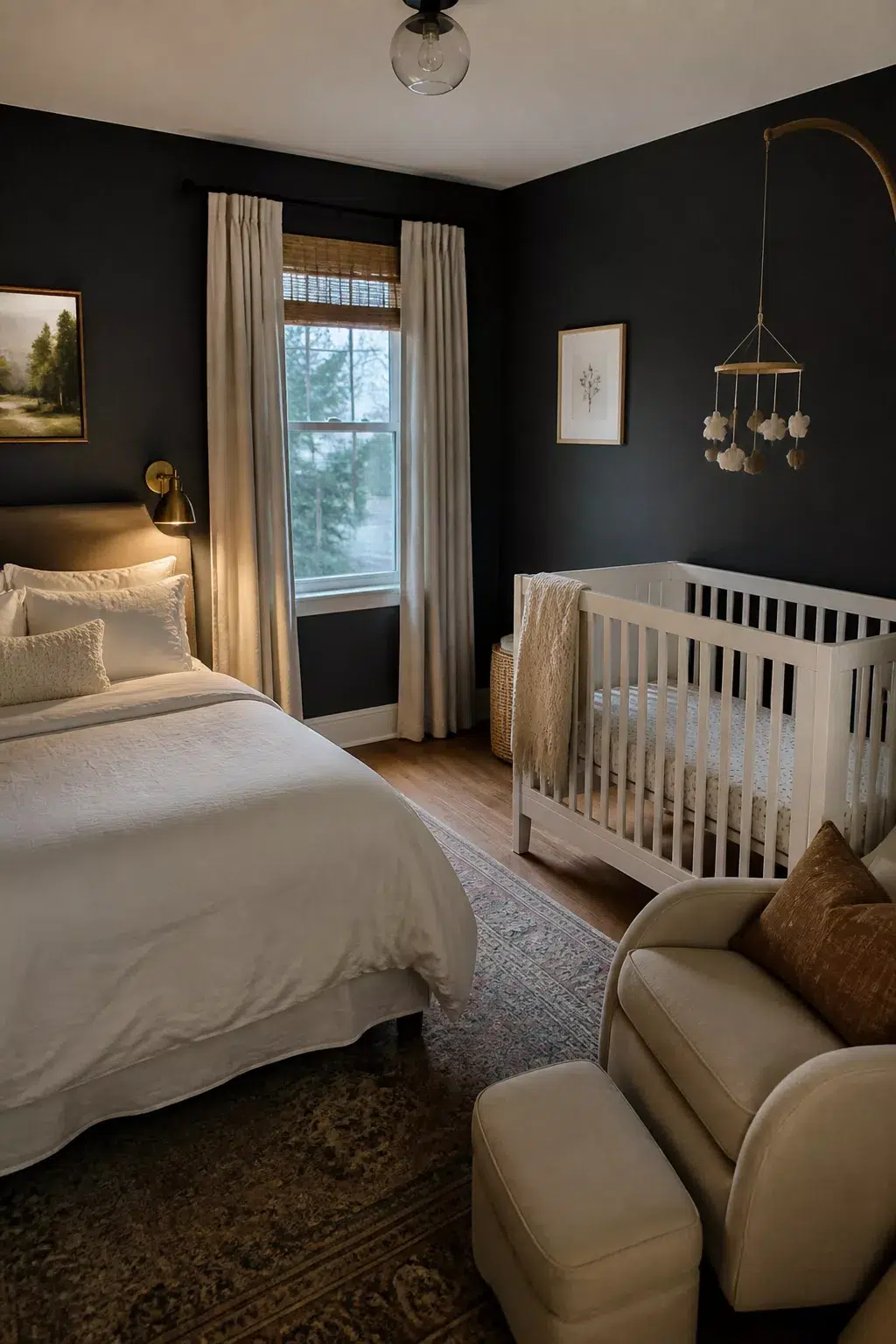Dark charcoal guest room and nursery combo ideas with white crib, cream armchair, and brass sconce lighting