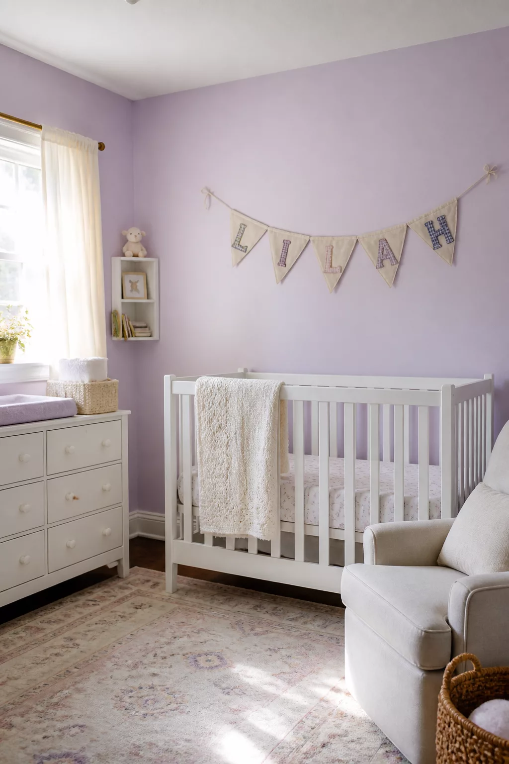 Burlap pennant nursery name sign spelling LILAH on lavender wall above white crib — nursery name signs idea